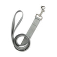 Load image into Gallery viewer, Grey reflective leash with metal clasp and padded loop handle rolled neatly
