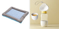 Load image into Gallery viewer, Blue cooling pet bed mat paired with beige and white pet feeder with heart detail on lid and food bowl.
