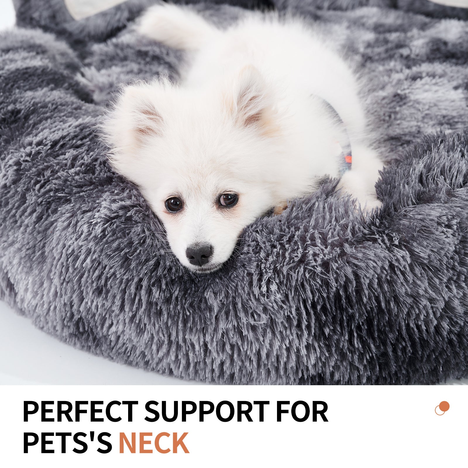 Close-up of small white dog resting head comfortably on plush gray bear paw pet bed