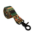 Load image into Gallery viewer, Rolled green, orange, and black geometric patterned nylon leash with metal swivel hook on white background
