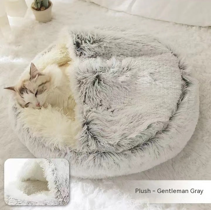 Cat sleeping in gentleman gray plush dome bed shown with plush interior