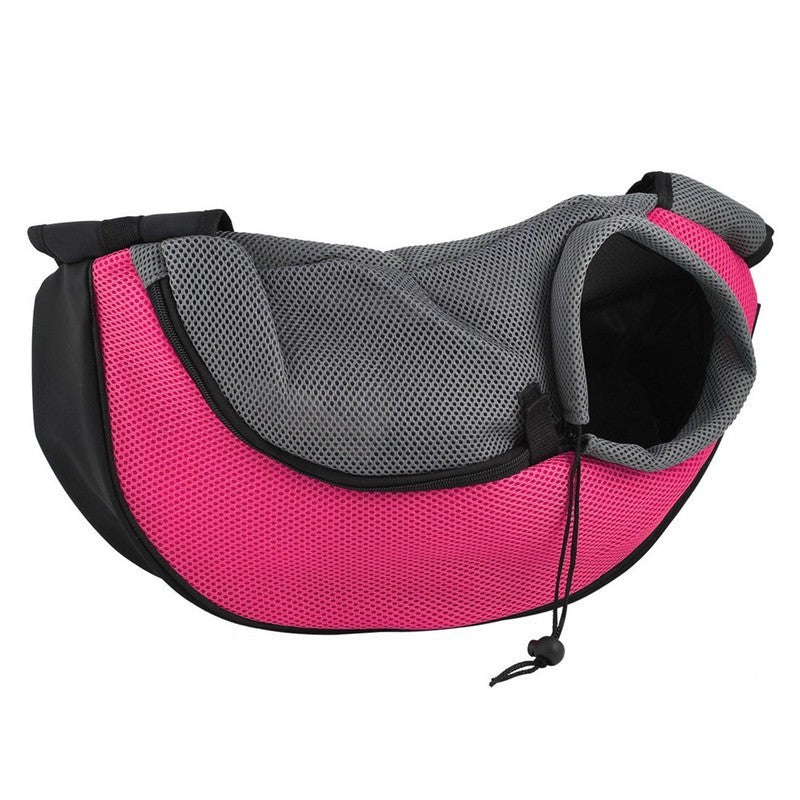 Pink and gray pet sling carrier isolated on white background