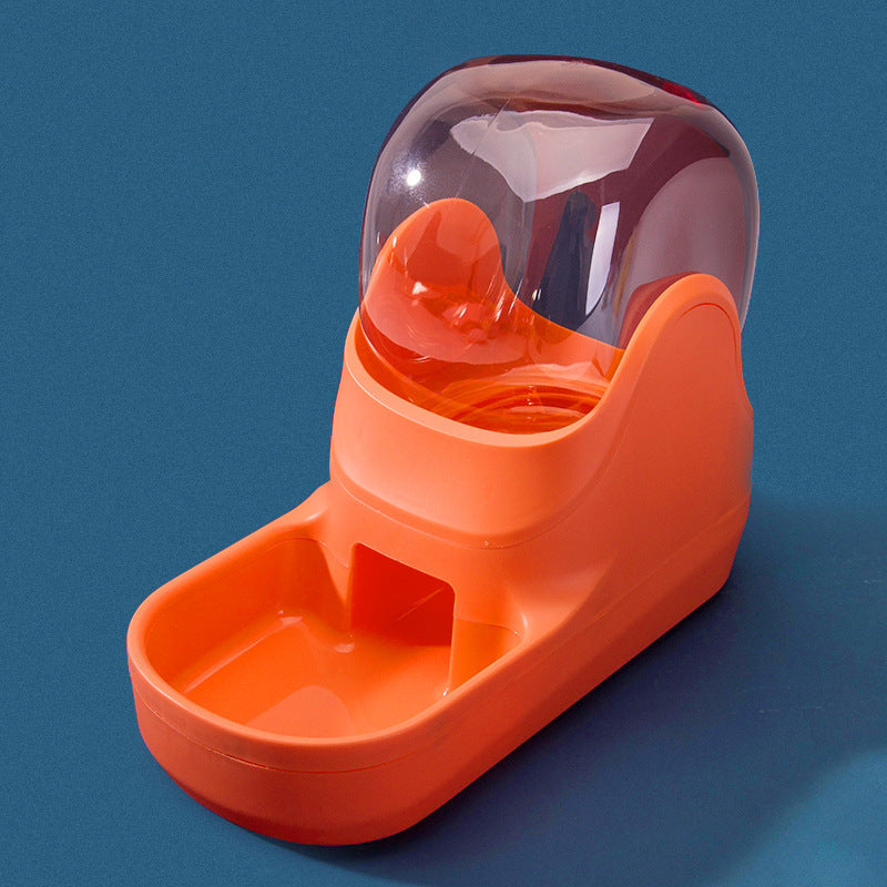 Orange automatic pet feeder fountain with clear food container on blue background