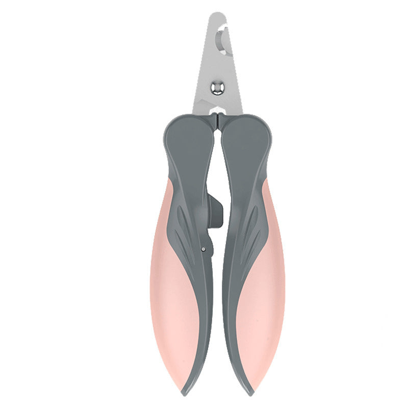 Closed pink and gray pet nail clipper viewed from above on gray background