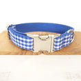 Load image into Gallery viewer, Close-up of metal buckle and D-ring on blue plaid adjustable collar
