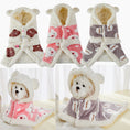 Load image into Gallery viewer, Three flannel hooded pet shawls in brown, pink, and gray with different prints and bear ears, displayed laid flat

