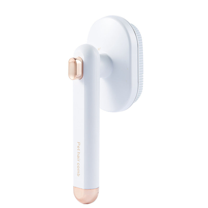 White rotating pet hair removal comb with rose gold accents isolated on white background.