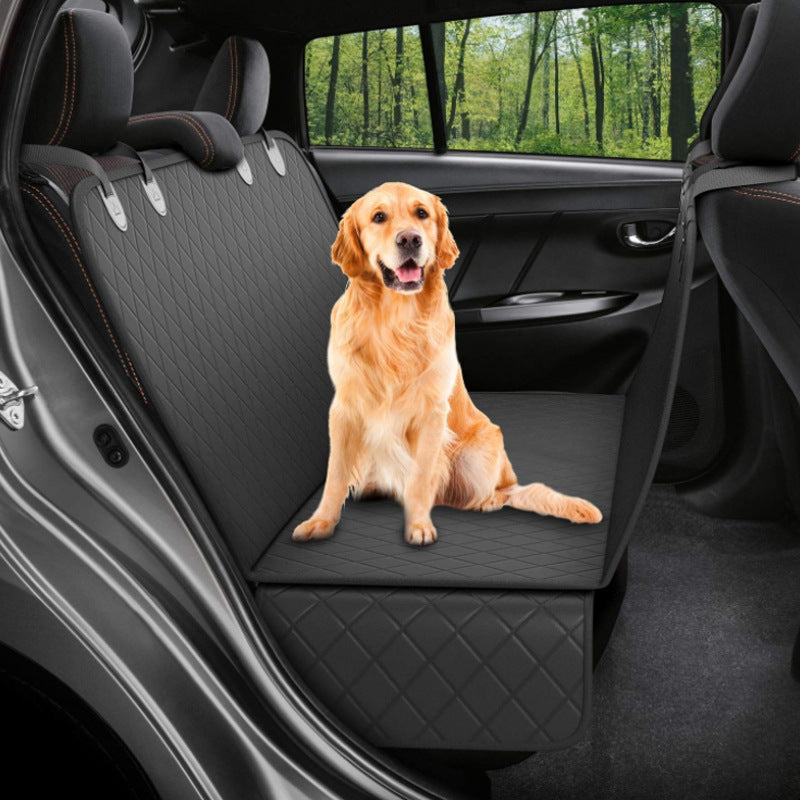 Golden retriever on black waterproof car seat cover without trim installed in rear seat