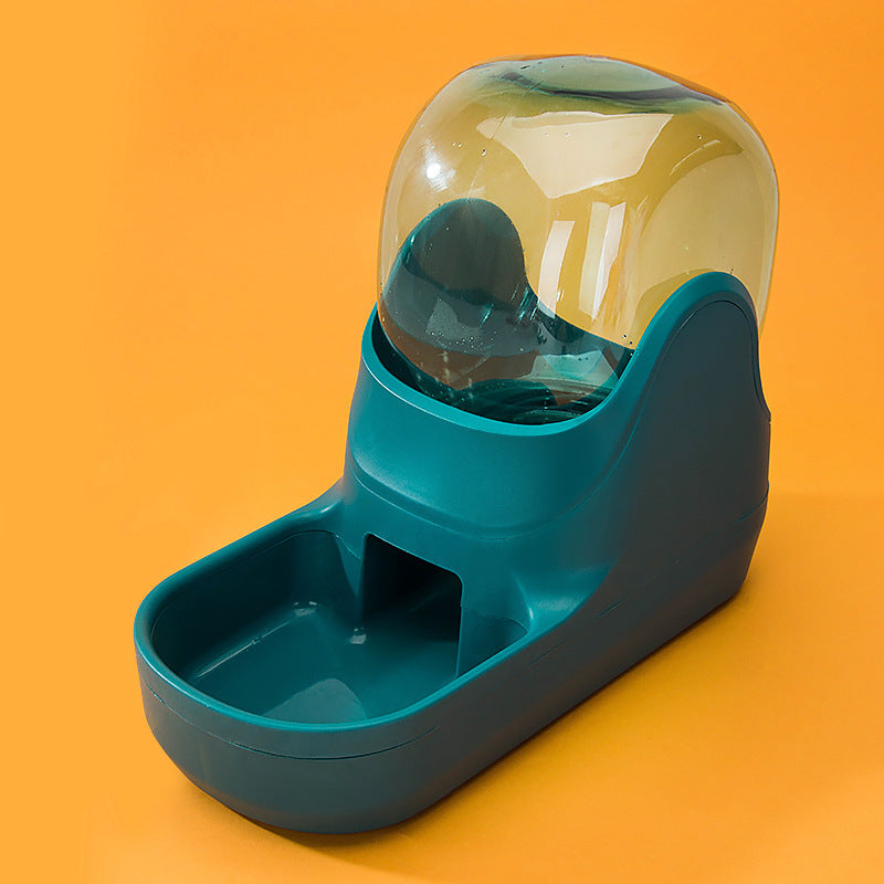 Close-up of blue automatic pet feeder fountain against orange background showing water container