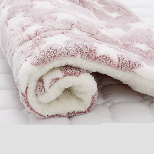 Rolled plush pet blanket with pink star pattern and white fleece lining