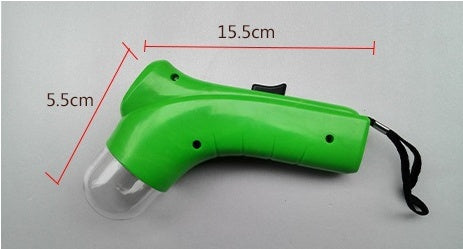Green interactive pet treat launcher with dimensions 15.5cm length and 5.5cm height labeled on image
