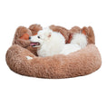 Load image into Gallery viewer, Light brown bear paw shaped plush bed with white dog laying inside
