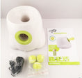 Load image into Gallery viewer, Ball launcher with power adapter, three yellow tennis balls, and instruction manual displayed on white surface
