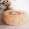 Load image into Gallery viewer, Round beige plush pet bed displayed with floral background
