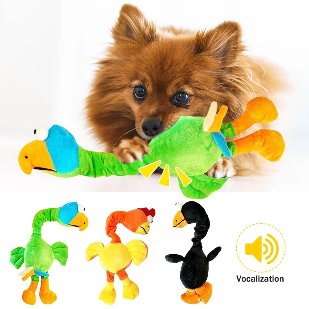 Small brown dog playing with a bright green and orange plush chicken squeaky toy