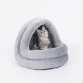 Load image into Gallery viewer, Light gray plush pet cave bed on white background featuring a cat inside playing with the hanging plush ball toy
