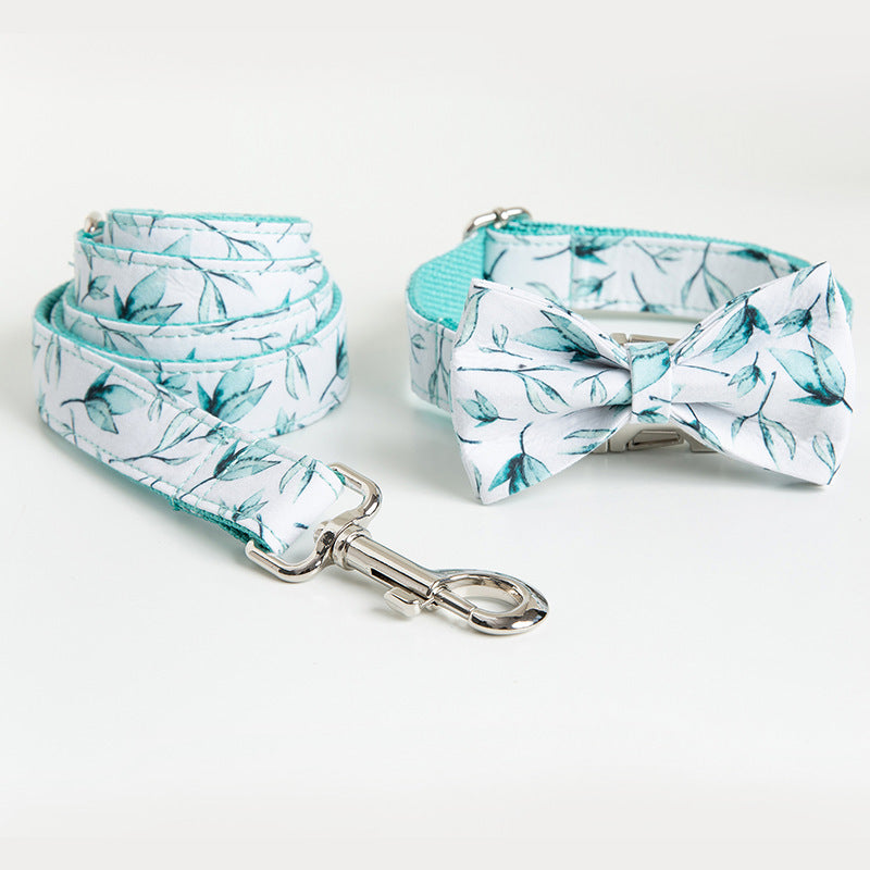 Small leaf patterned dog collar and leash set with silver metal clips and matching bow tie
