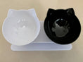 Load image into Gallery viewer, Top view of one black and one clear cat ear bowl on white elevated stand with red text indicating bowl count
