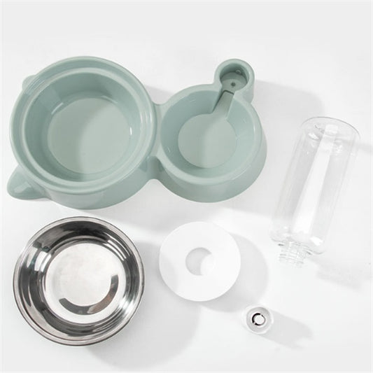 Disassembled components of automatic pet feeding station showing plastic base, stainless steel bowl, water bottle, and refill parts