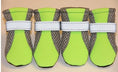 Charger l'image dans la visionneuse de la galerie, Four lime green breathable dog shoes with gray mesh sides and white adjustable straps
