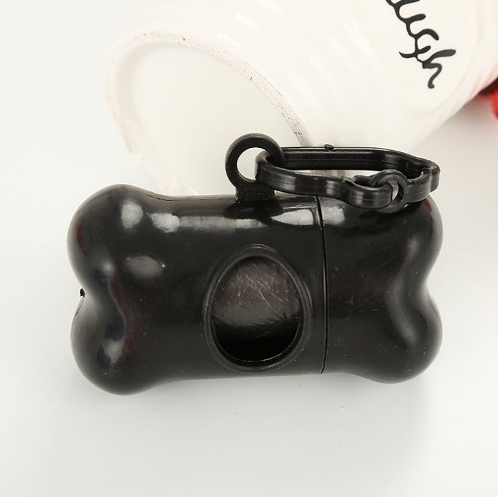 Black bone-shaped dog waste bag dispenser with loop hook