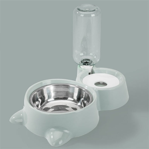 Green automatic pet feeding station with stainless steel bowl, water bottle, and rounded support feet