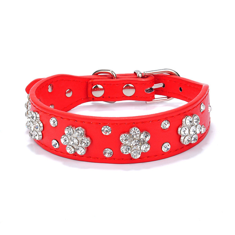 Red rhinestone dog collar featuring floral embellishments and buckle