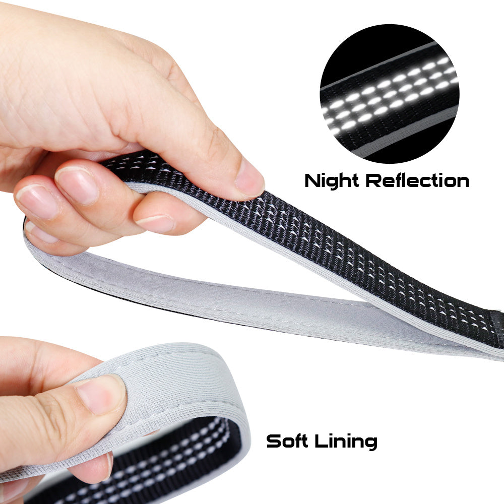 Black reflective stitched leash with soft inner lining shown in hand for comfort
