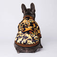 Charger l'image dans la visionneuse de la galerie, Back view of French Bulldog in black and gold dog coat showing intricate floral design
