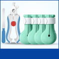 Load image into Gallery viewer, Four turquoise silicone cat nail covers with a white and blue nail clipper and file
