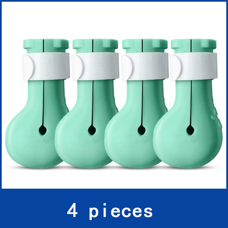 Four turquoise silicone cat nail covers lined up showing front view