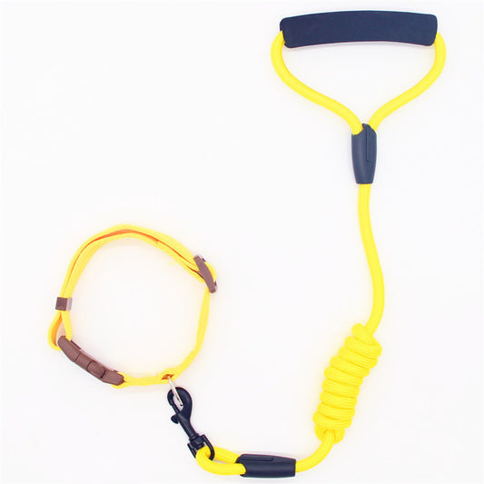 Yellow dog leash and adjustable collar set with foam-padded handle on white background