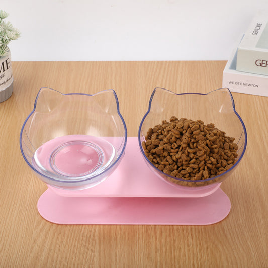 Dual transparent cat ear bowls on a pink elevated stand, with one bowl filled with brown pet kibble