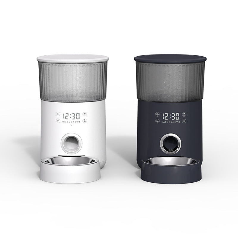 Two automatic pet feeders side by side showing white and dark gray color options with stainless steel bowls