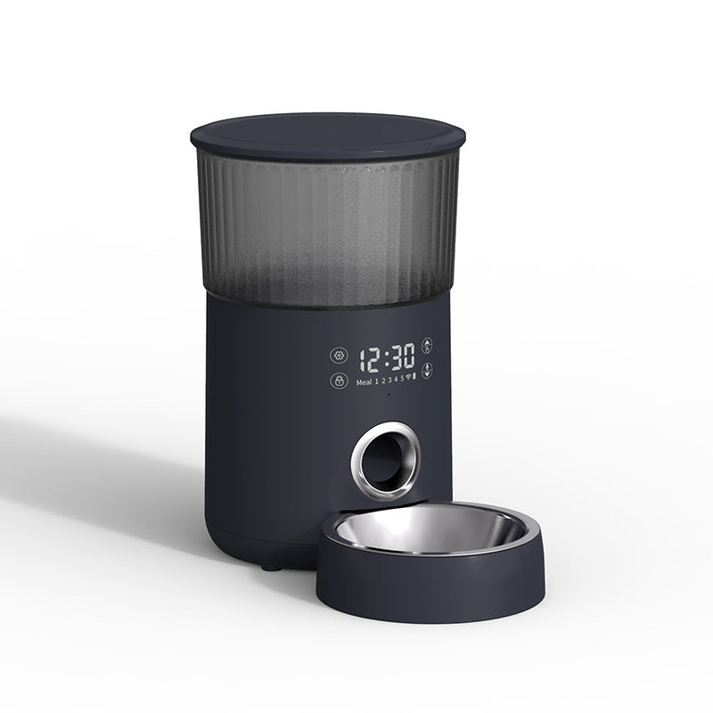 Dark gray automatic pet feeder with stainless steel bowl and translucent ribbed food container