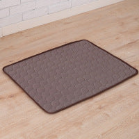 Dark brown pet cooling mat cleanly displayed on wooden floor