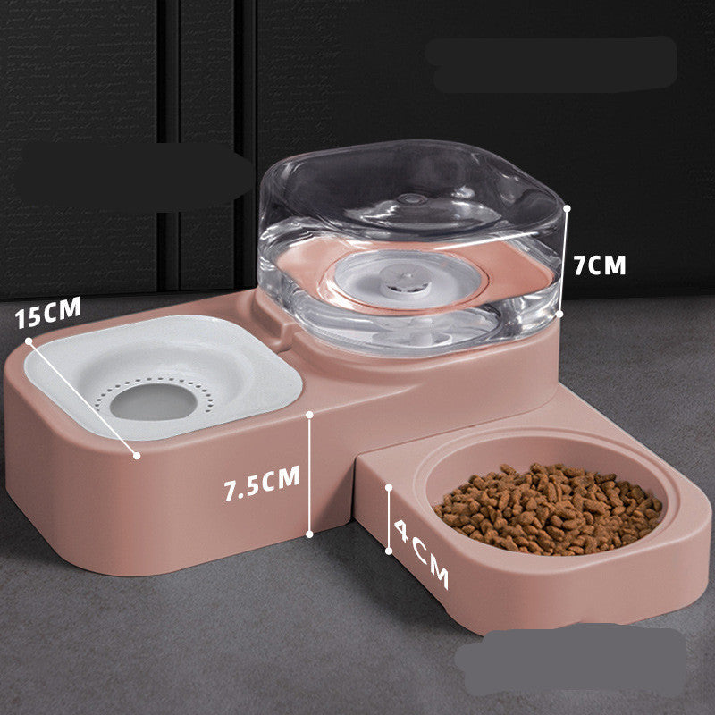 Close-up of dusty pink feeder highlighting reservoir and food bowl with measurement tags