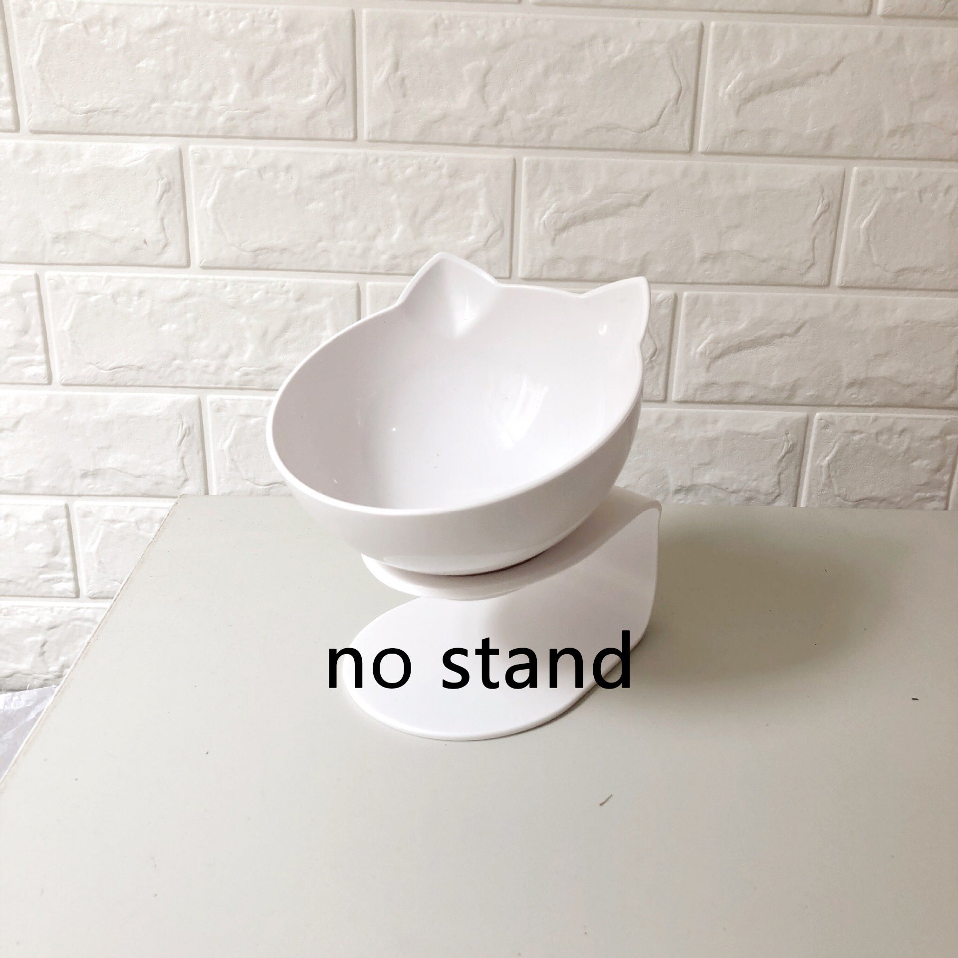 Single white cat ear bowl without stand on white surface