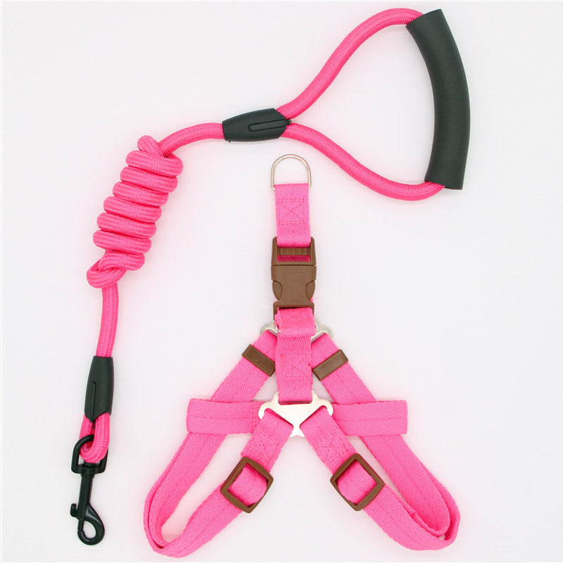 Pink nylon dog harness with adjustable straps and matching shock-absorbing leash with padded handle