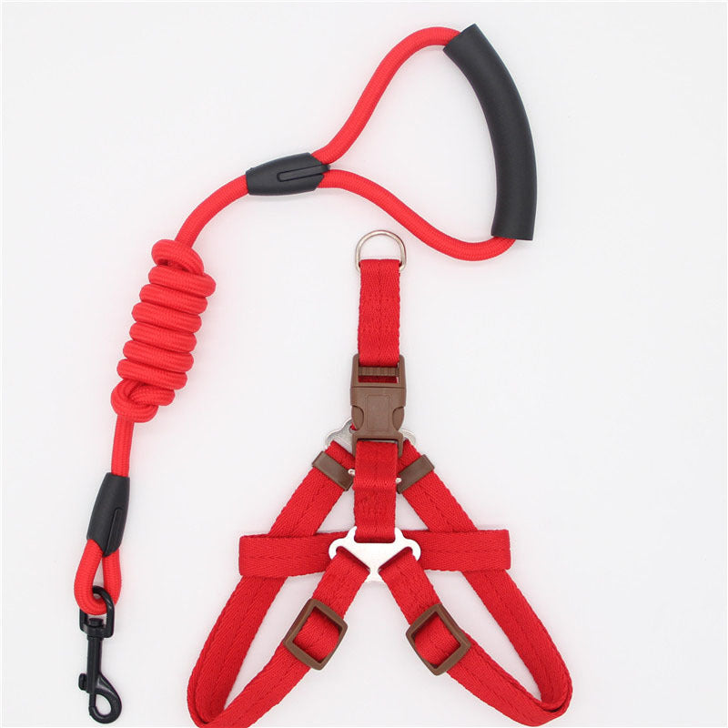 Red nylon dog harness with adjustable straps and matching shock-absorbing leash with padded handle