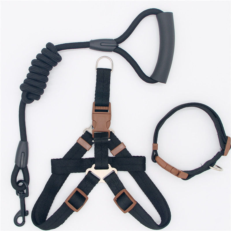 Black nylon dog harness and collar set with leash attached