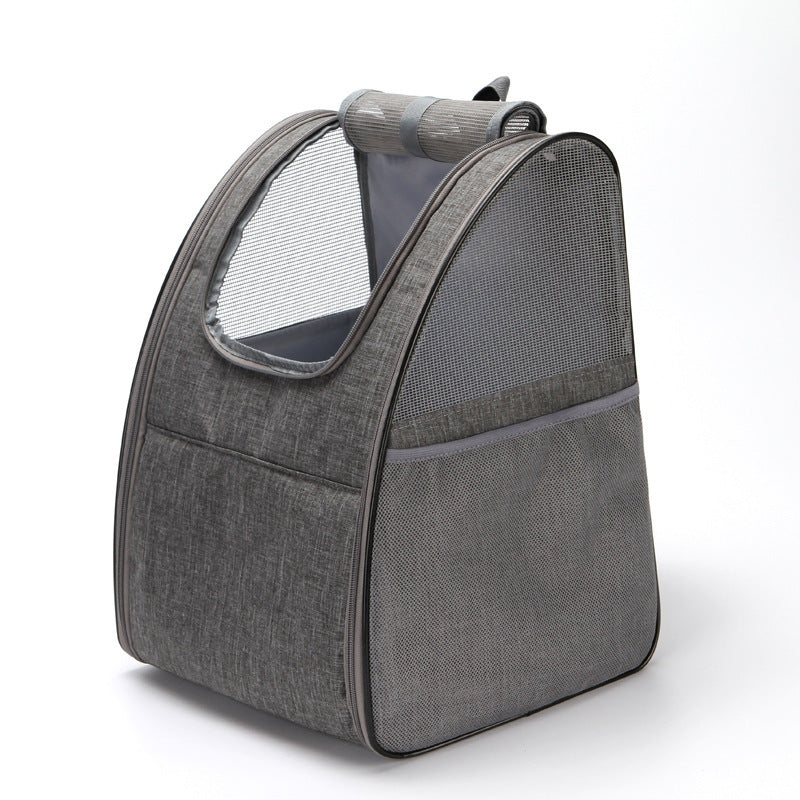 Gray foldable pet carrier backpack angled to show mesh side pocket and top mesh opening