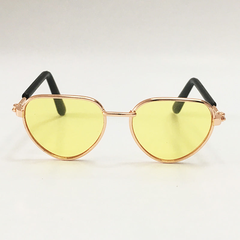 Yellow tinted aviator sunglasses for cats with rose gold metal frame and black temple tips