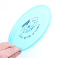 Load image into Gallery viewer, Hand holding light blue flexible dog flying disc with dog graphic
