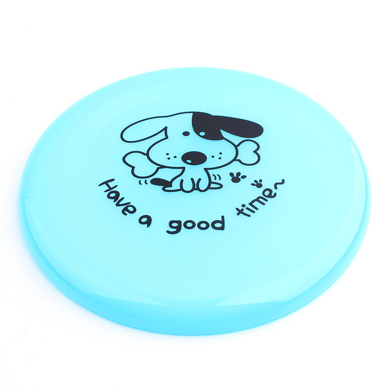 Close-up of light blue dog flying disc with dog illustration and 'Have a good time' text