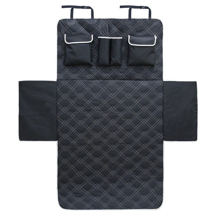 Flat view of unfolded dog mat with straps and multiple storage pockets