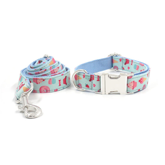 Large dog collar and leash set with blue ice cream cartoon pattern laid flat