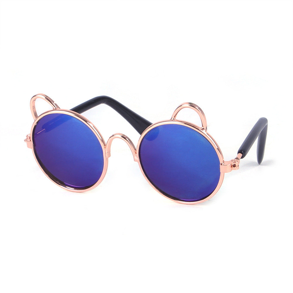 Cat ear round sunglasses with blue mirrored lenses and rose gold metal frame