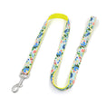 Load image into Gallery viewer, Fully extended floral dog leash laid flat showing colorful floral pattern and metal clasp

