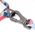 Load image into Gallery viewer, Close-up of strong metal clasp on leash with vibrant geometric pattern
